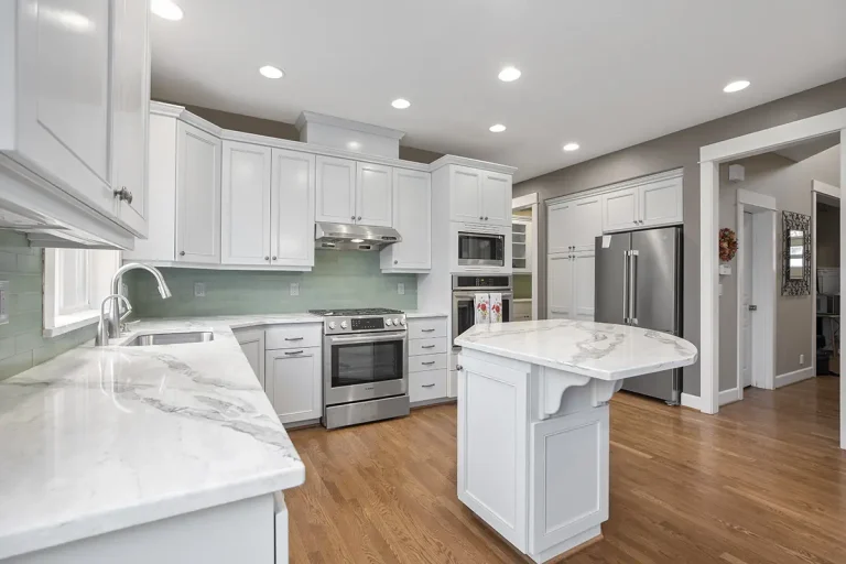 white-cabinets-green-walls-and-wooden-floors-kitchen-remodel-by-pdx-remodeling-and-design